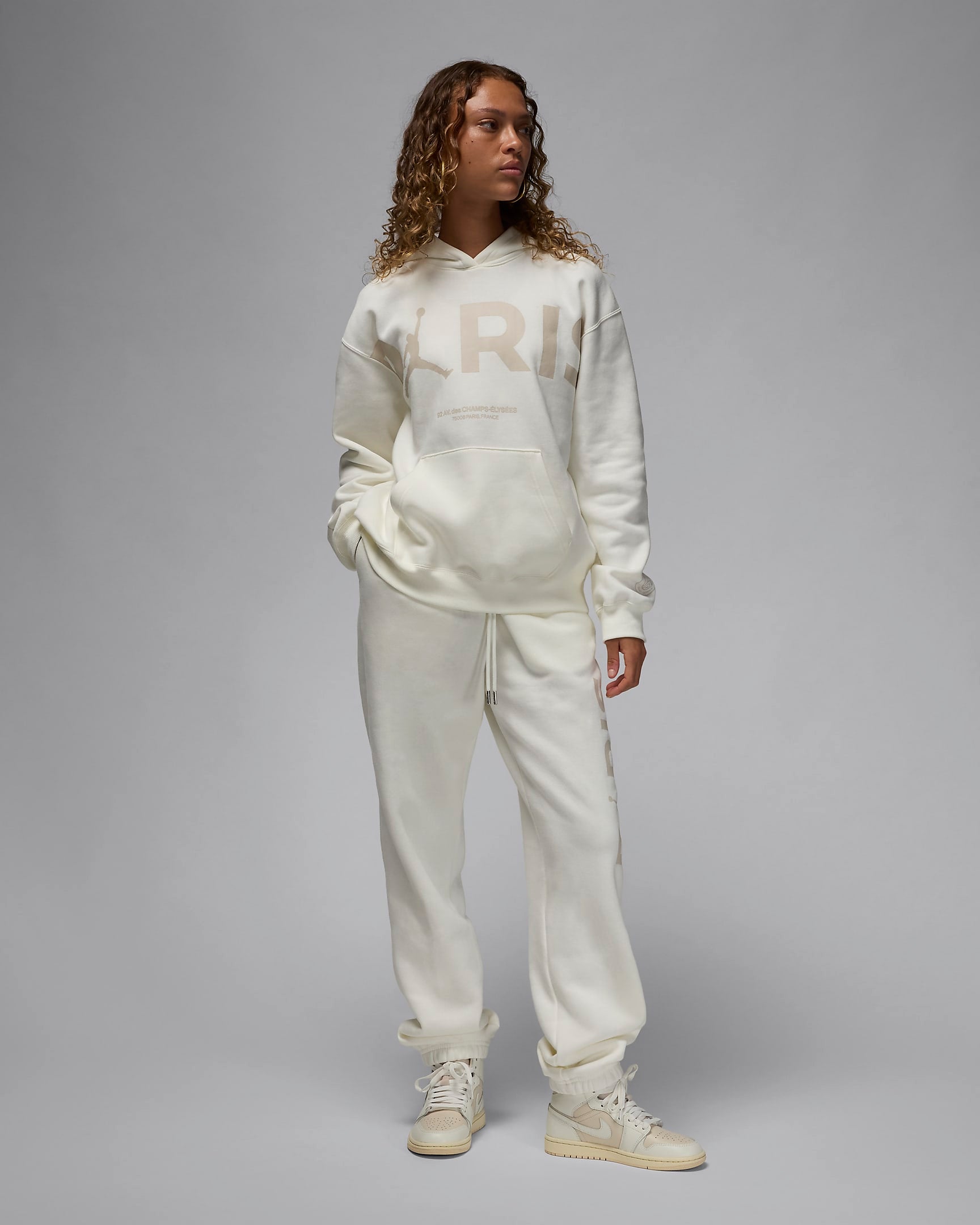 Image of Дамски Панталон NIKE W J PSG BRKLN FLC GFX PANT