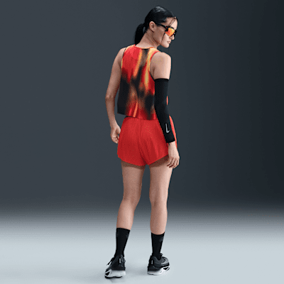 Image of Дамски Потник NIKE W NK DFADV ARSWT AOP CRP TANK, Балистик,оранжев цвят