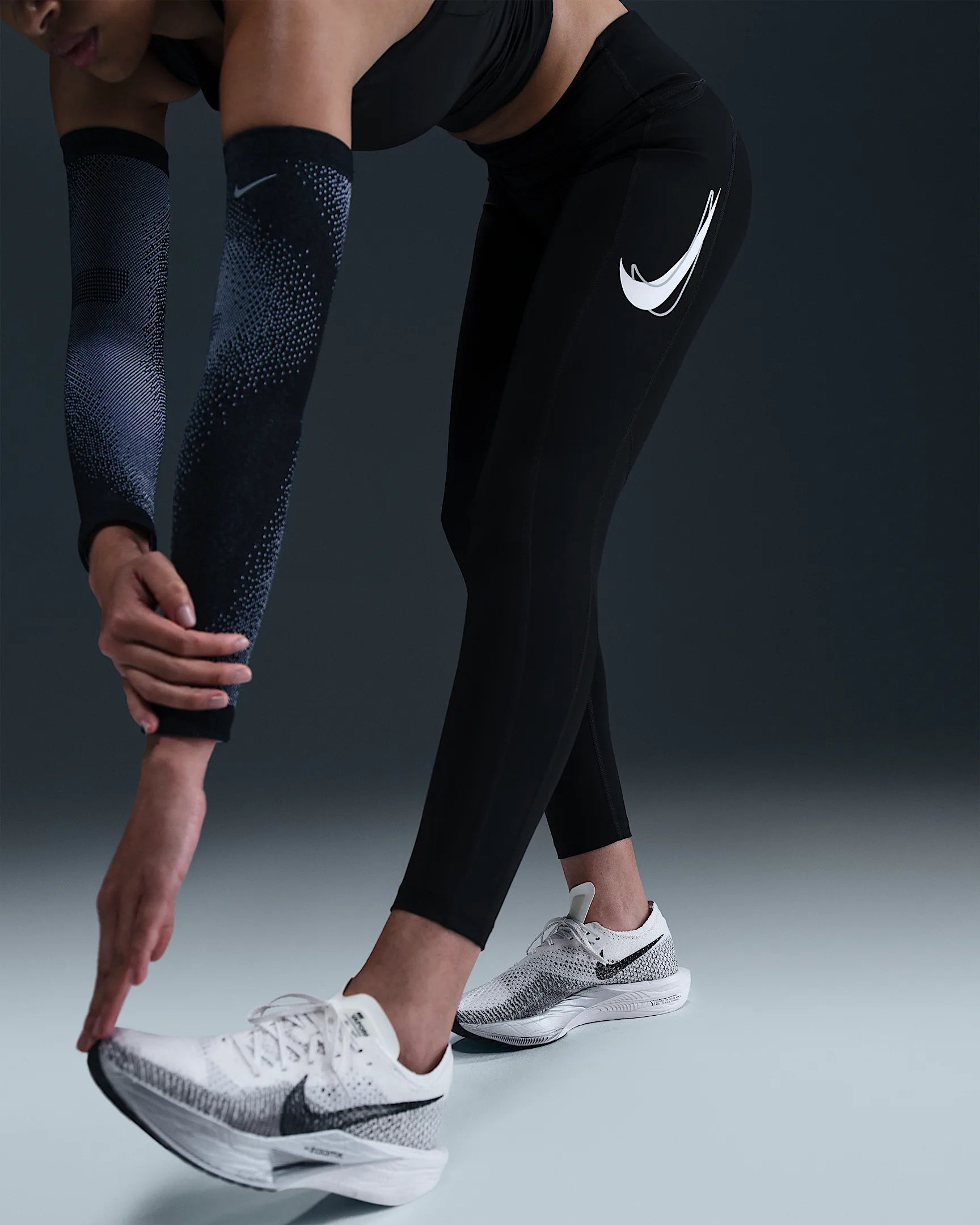 Дамски Клин NIKE W NK FAST DF MR 7/8 TGT SW - Ballistic-sport 