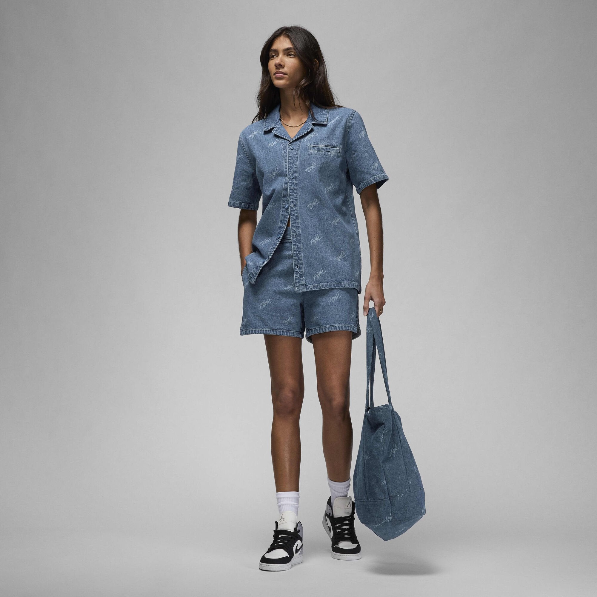 Image of Women's T-shirt NIKE WJ SS AOP WVN TOP