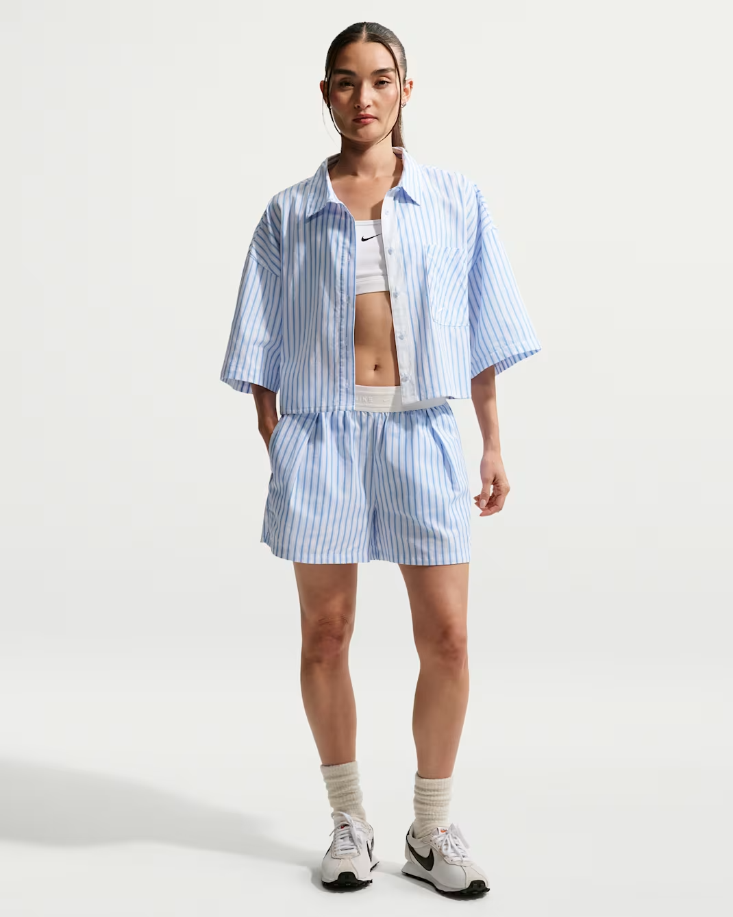 Image of Дамска Тениска NIKE W NSW OFFLN WVN PPLN STRP SS