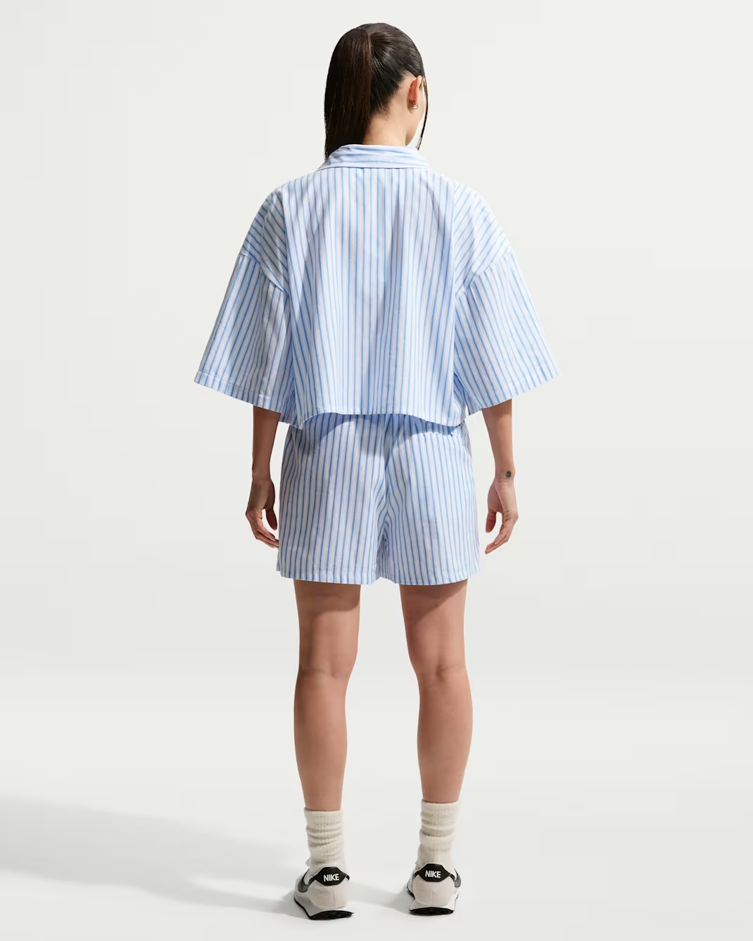 Image of Дамска Тениска NIKE W NSW OFFLN WVN PPLN STRP SS
