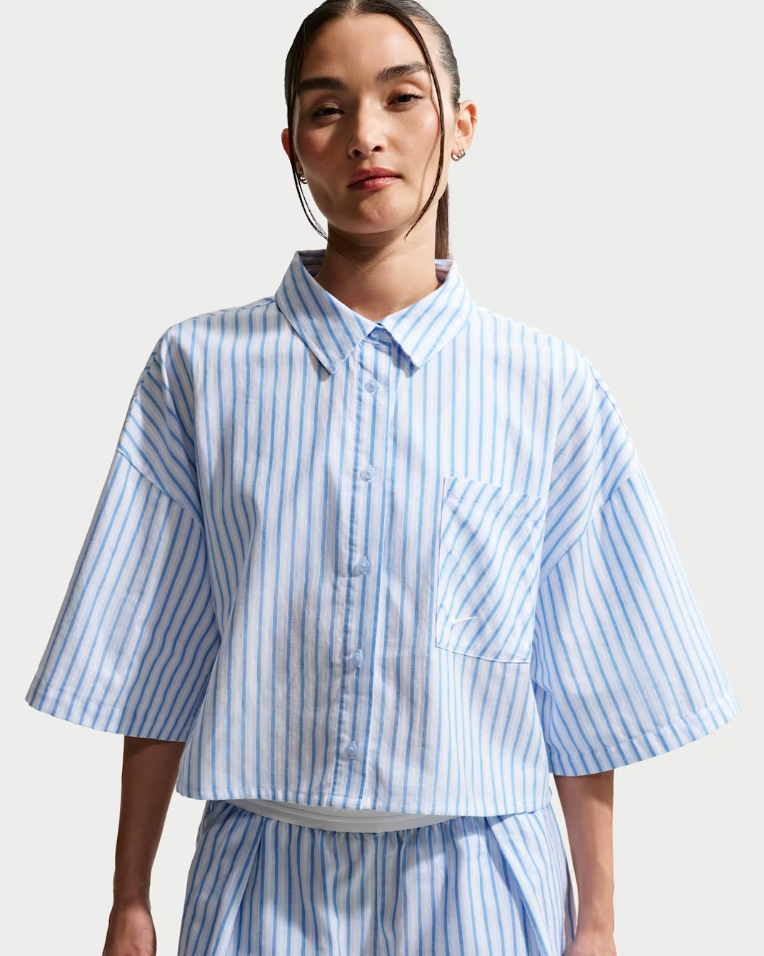 Image of Дамска Тениска NIKE W NSW OFFLN WVN PPLN STRP SS
