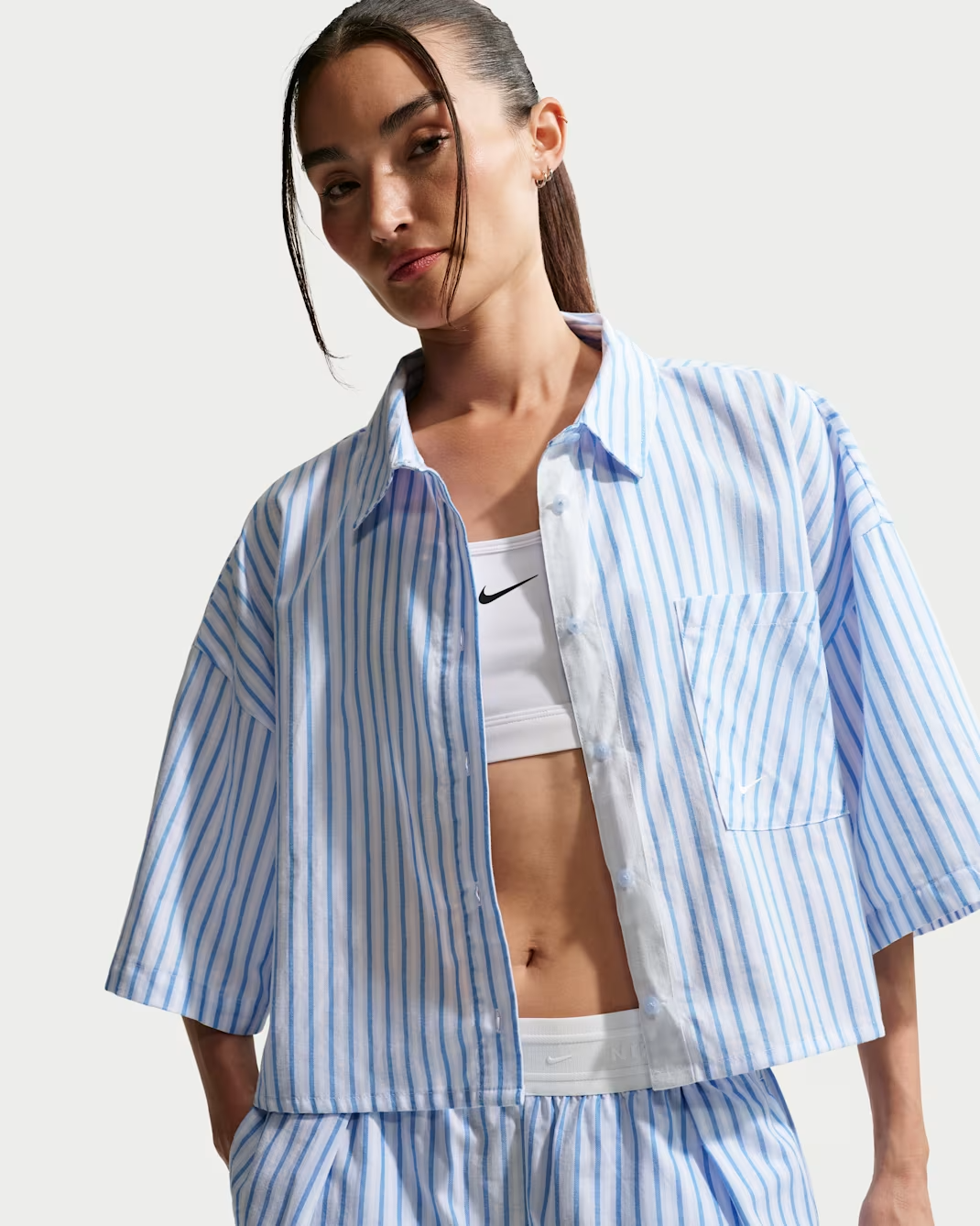 Image of Дамска Тениска NIKE W NSW OFFLN WVN PPLN STRP SS